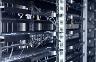 Technician repairing a Bitcoin ASIC mining rig in Nigeria